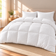 All-Season Down Alternative Comforter in white, box-quilted with corner tabs, on a made bed