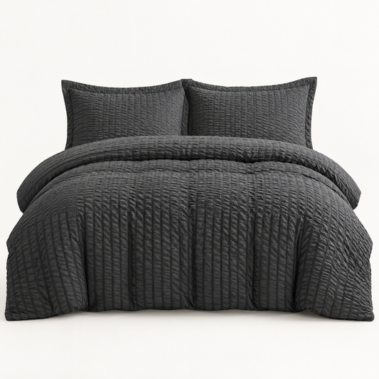 Seersucker Textured Duvet Cover Set in dark grey layered on a made bed