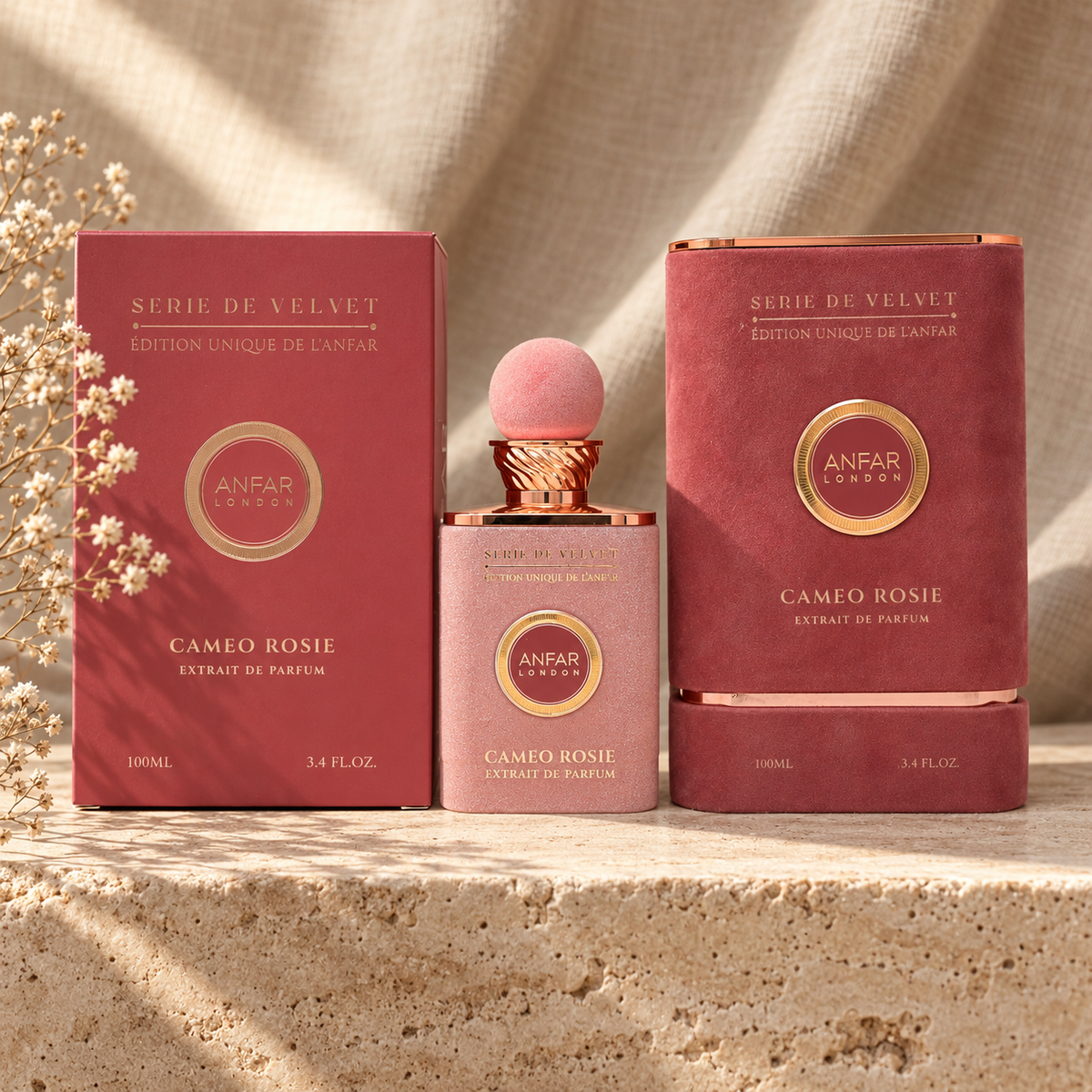 Anfar London Cameo Rosie Extrait de Parfum 100 ml blush pink bottle and dusty rose box on a travertine ledge with linen backdrop
