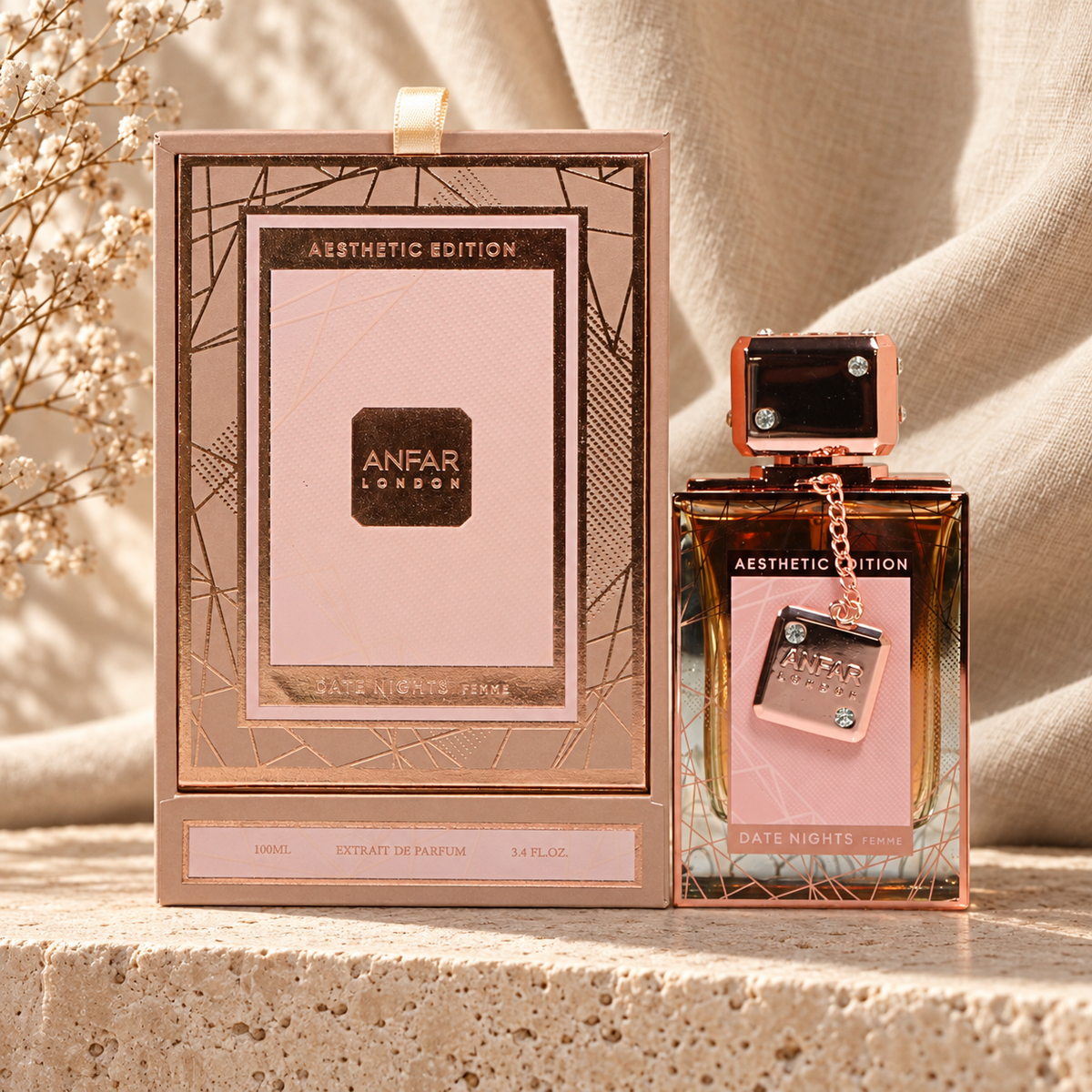 Anfar London Date Nights Femme Extrait de Parfum 100 ml bottle and rose gold box on a travertine ledge with linen backdrop