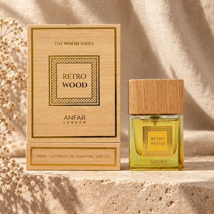Anfar London Retro Wood Extrait de Parfum 100 ml bottle and pale wood gold lattice box on a travertine ledge with linen backdrop