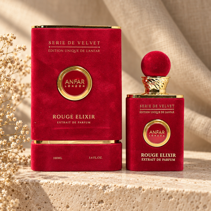 Anfar London Rouge Elixir Extrait de Parfum 100 ml bottle and crimson velvet case on a travertine ledge with linen backdrop