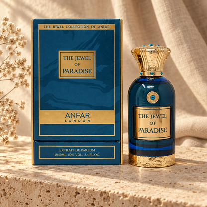 Anfar London The Jewel of Paradise Extrait de Parfum 100 ml bottle and teal blue gold trimmed box on a travertine ledge with linen backdrop